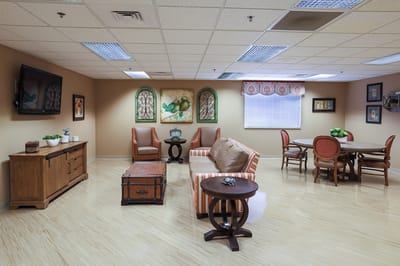 Bright common area with seating and decor
