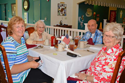 A group of residents enjoying a meal together