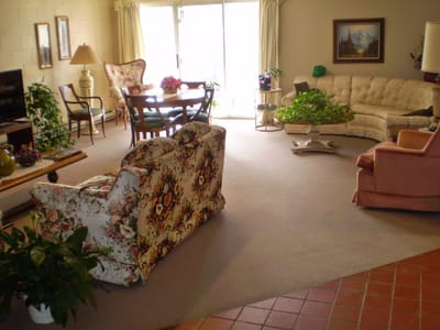 Cozy common area with seating and plants