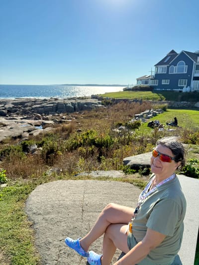 A resident enjoying the outdoor space by the shoreline