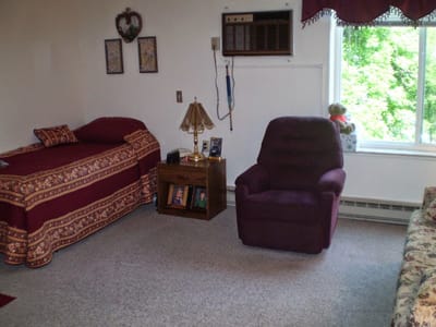 Interior view of a resident's room with furnishings