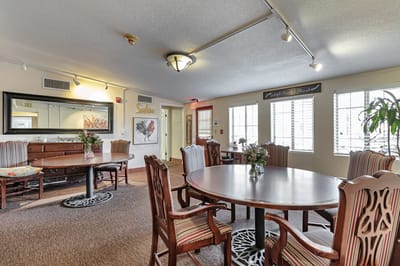 Bright common area with tables and chairs