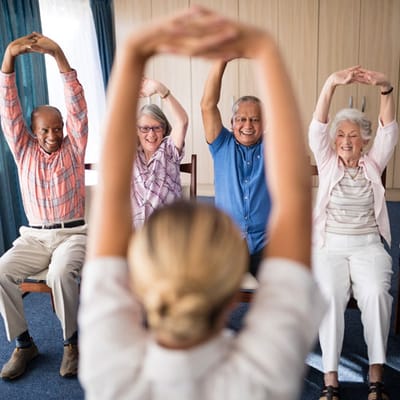 Residents participating in a group exercise activity