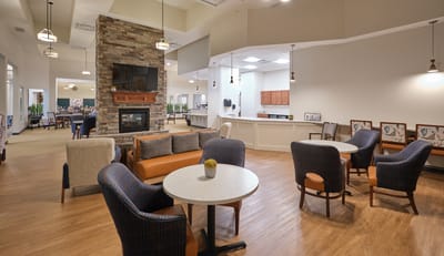 Common area with seating and a fireplace