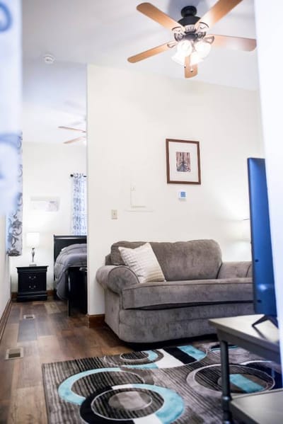 Cozy resident room with a couch and bed