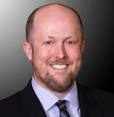 Professional portrait of a man in a suit