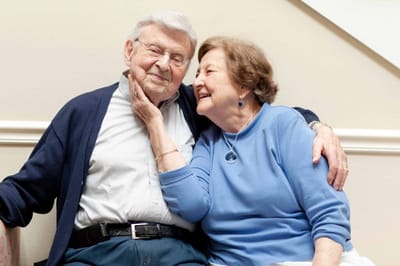Elderly couple enjoying a moment together indoors