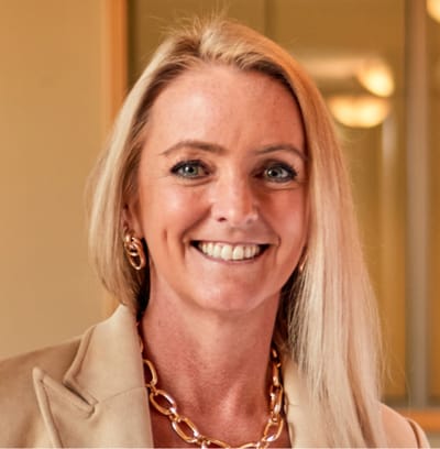 Smiling staff member in a professional setting