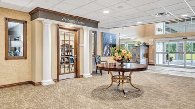 Interior view of the Welcome Center with floral arrangement