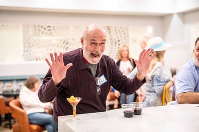 Resident enjoying a drink in a common area