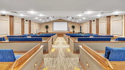 Interior view of a spacious activity room with seating
