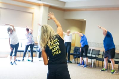 Residents participating in a group exercise class