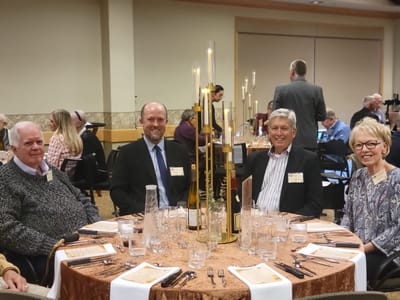 Residents enjoying a meal at a dining event