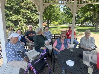 Residents enjoying time together in a gazebo