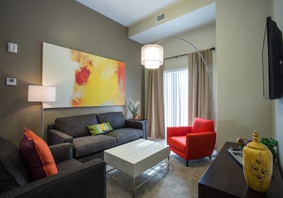 Modern living room setup with furniture and art