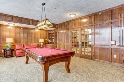 Interior common area with a pool table and seating