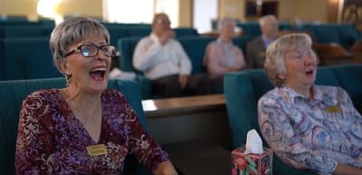 Residents enjoying a live performance in the common area