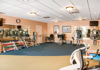 Interior view of a gym with exercise equipment