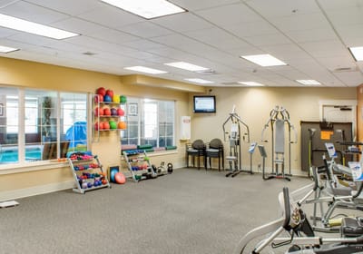 Interior view of a fitness room with exercise equipment