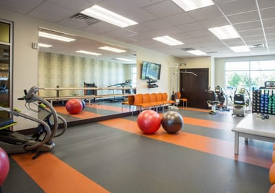 Interior view of a fitness area with exercise equipment