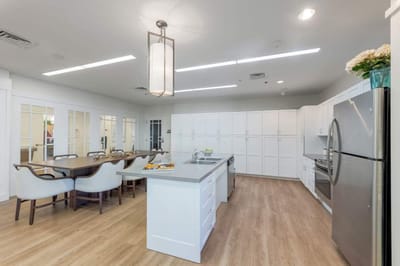 Bright and airy kitchen area with dining space