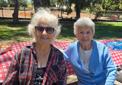 Two female residents enjoying the outdoors together