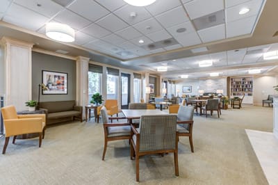 Interior view of a cozy common area with seating