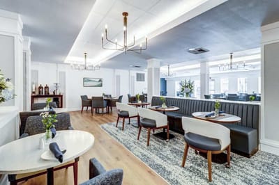 Bright dining area with elegant decor and seating