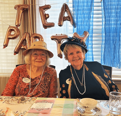 Residents enjoying tea party with decorations