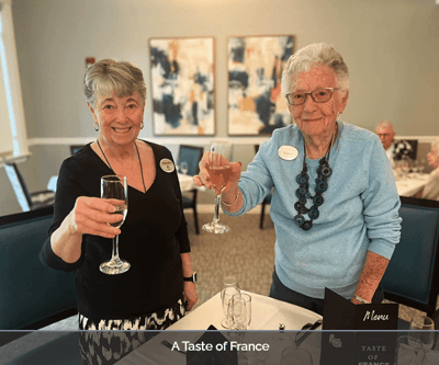 Residents toasting during a themed event