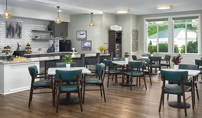 Bright dining room with tables and chairs