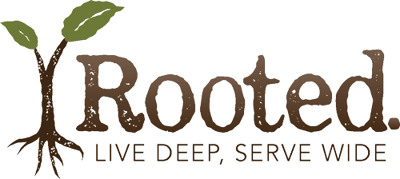 Rooted logo with tree and tagline