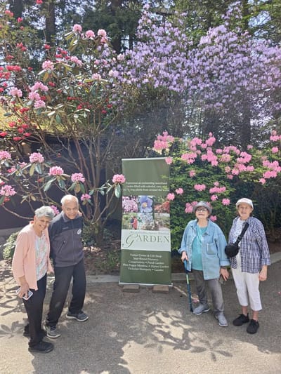 Residents enjoying time in a garden area