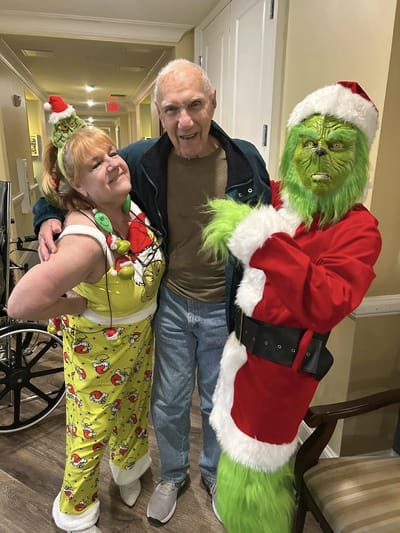 Residents celebrating with holiday costumes and decorations
