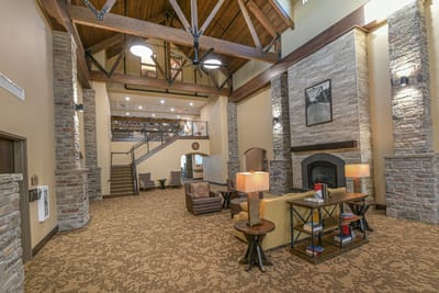 Well-lit interior common area with cozy seating