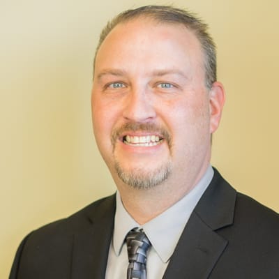 Professional portrait of a man in a suit