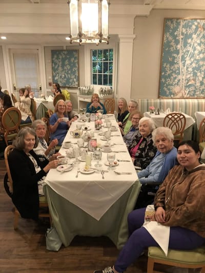 Residents enjoying a meal in the dining room