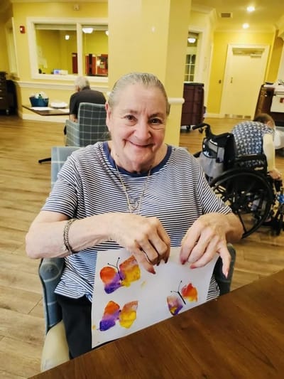 Resident engaging in an arts and crafts activity