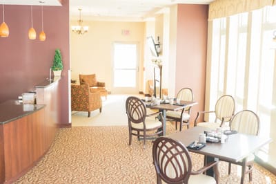 Bright dining area with tables and chairs