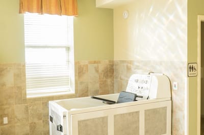 Interior view of a bathing area with a tub