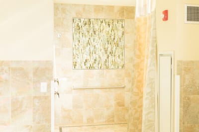Interior shot of a shower area in a facility