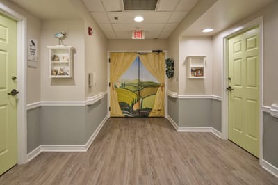 Brightly decorated hallway with themed doors and decor