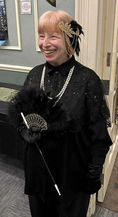 Resident dressed up celebrating an event