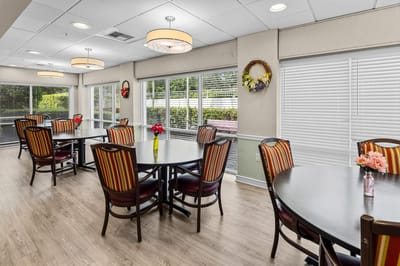 Dining area with tables and flowers