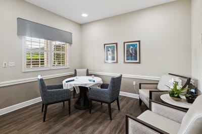 Bright, inviting common area with seating and artwork