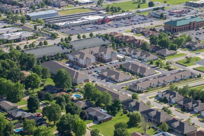 Aerial view of The Fremont Senior Living facility with outdoor spaces