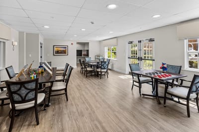 Bright activity room with tables and games