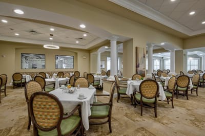 Dining room with tables set for meals