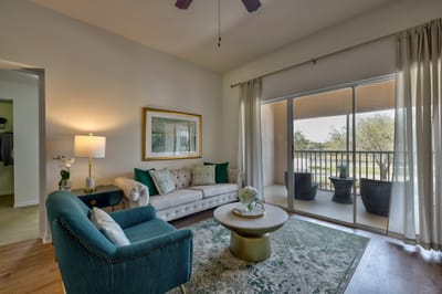 Bright and inviting living area with balcony access