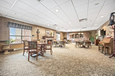 Interior view of a common area with seating and fireplace